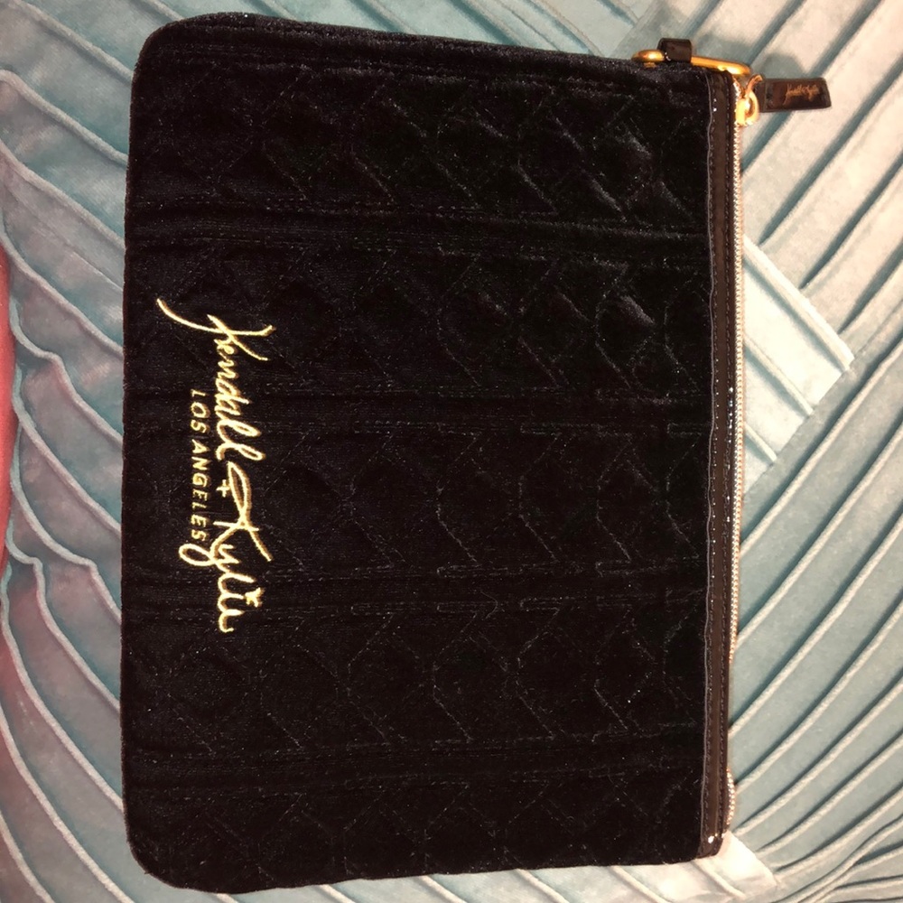 Kendall and Kylie black and gold makeup pouch